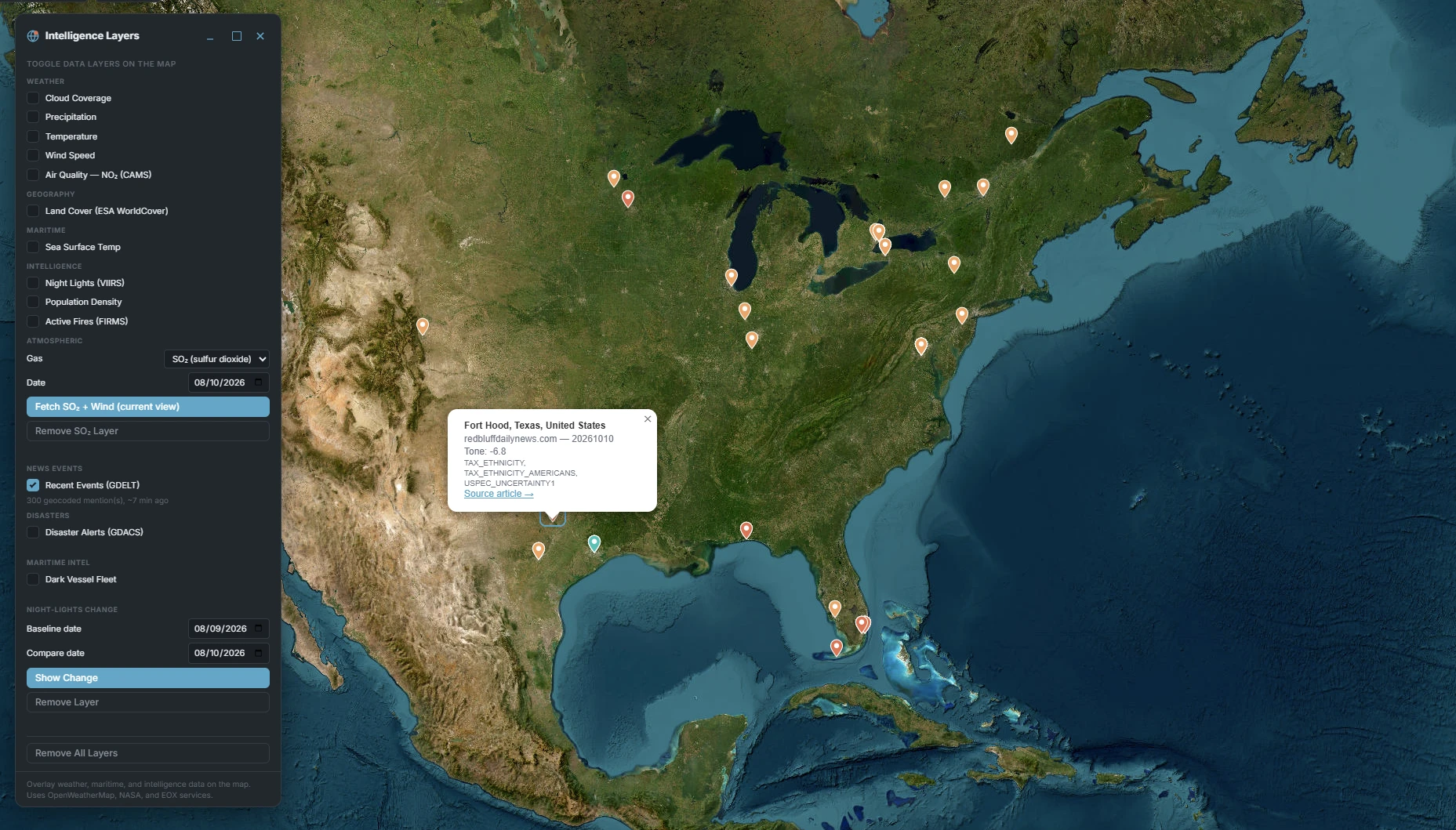 GDELT news events plotted as orange pins across eastern North America, Intelligence Layers panel open with Recent Events (GDELT) checked and '300 geocoded mention(s), ~7 min ago' shown, a popup open for a Fort Hood, Texas article listing its source, a tone score of -6.8, GDELT theme tags and a source-article link.